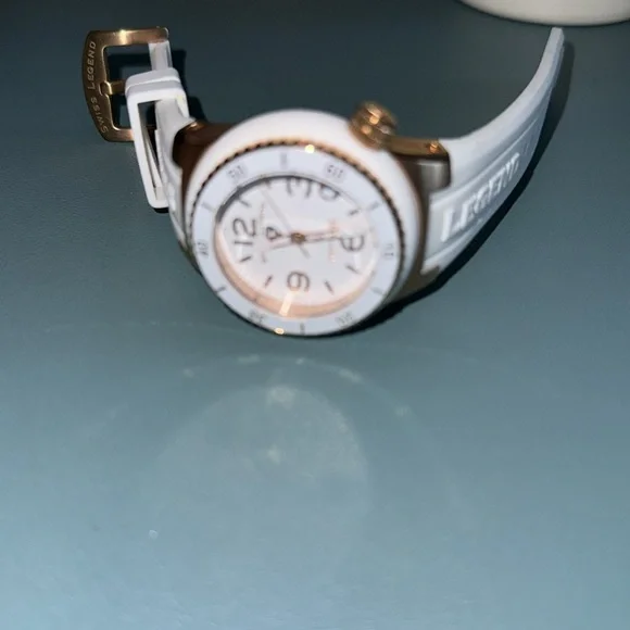 Swiss Legend, Neptune, white and rose gold watch. Has instruction manual.